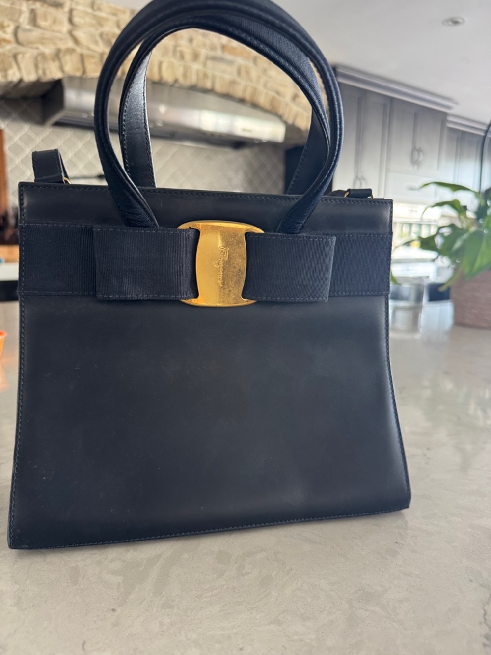 Salvatore Ferragamo Black Leather Top-Handle Tote with Gold Bow Plaque